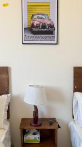Ένα ή περισσότερα κρεβάτια σε δωμάτιο στο Happy View Inn