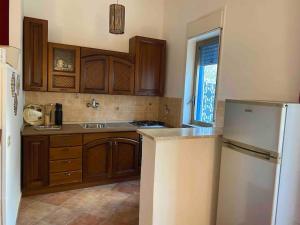 Kuchyň nebo kuchyňský kout v ubytování Mondello Apartment Mare beach