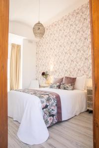 Postel nebo postele na pokoji v ubytování Hostal Benalup Atalaya