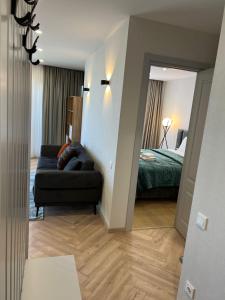 Postel nebo postele na pokoji v ubytování Aparthotel Holiday Lux Batumi