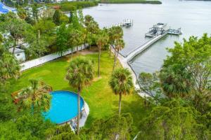 an aerial view of a park with a pool and palm trees at Huge Waterfront Mini-Resort with Gym, Dock and Pool in Riverview