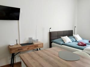 A seating area at Air-conditioned, quiet Apartment - center of Sankt Pölten - Smart TV Még 16 kép