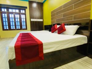 Hotel Rajshree Palace客房内的一张或多张床位