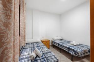Postel nebo postele na pokoji v ubytování Apto Emeterio Los Cristianos By Paramount Holidays