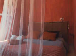Cama o camas de una habitación en Hostal Esfigueral