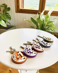 a white table with a bunch of buttons on it at Quart de Lune - Boutique B&B in Aosta