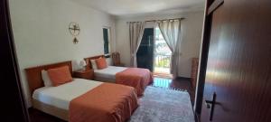 Katil atau katil-katil dalam bilik di Costa Azul
