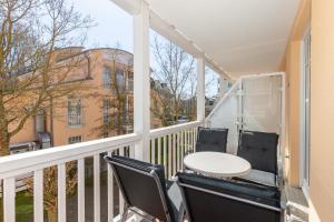 Ein Balkon oder eine Terrasse in der Unterkunft Dünenschloss Dünenschloss 2-09
