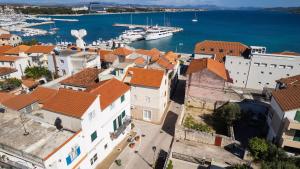 an aerial view of a town with boats in the water at Apartment Tina in Vodice