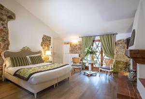 A bed or beds in a room at Residenza le Colline del Paradiso