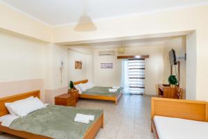 Postel nebo postele na pokoji v ubytování Zenstay Hotel