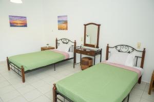 Postel nebo postele na pokoji v ubytování Almy Beach Hotel