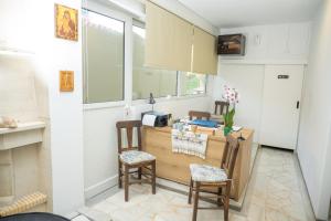 Kuchyň nebo kuchyňský kout v ubytování Almy Beach Hotel