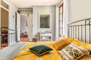 Postel nebo postele na pokoji v ubytování Maison Dix Chambres d'hôtes et Espace SPA Bien être