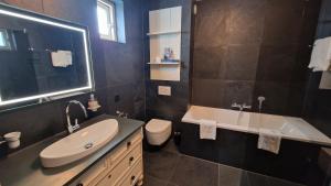 Koupelna v ubytování B&B De Droomhoeve
