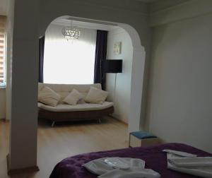 Кровать или кровати в номере DEMİR OTEL RESTAURANT