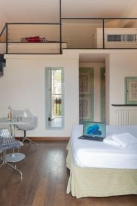 Rúm í herbergi á Albergo Minerva