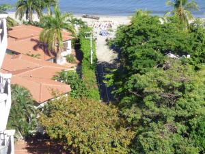 an aerial view of a beach with palm trees at Bello Horizonte * Unido Al Mar in Santa Marta +83 photos