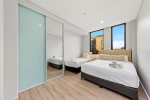 Katil atau katil-katil dalam bilik di Elegant and modern Style Apartments for long term tenants in Dulwich hill