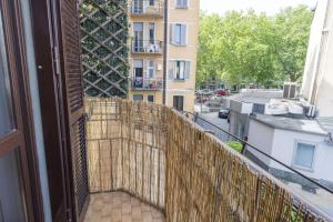 a balcony with a view of a building at Easylife - Lussuosa dimora in Porta Romana in Milan
