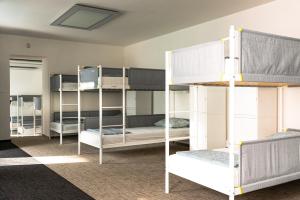 Ένα ή περισσότερα κρεβάτια σε δωμάτιο στο Wild Elephants Hostel