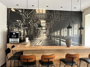 Kuchyň nebo kuchyňský kout v ubytování Hotel Fly ´ In