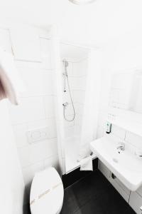 Koupelna v ubytování City Hotel Fellbach 24H CHECK-IN