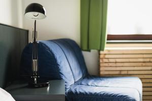 Posezení v ubytování City Hotel Fellbach 24H CHECK-IN