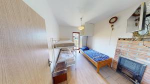 Postel nebo postele na pokoji v ubytování U MIRASE Heřmaničky