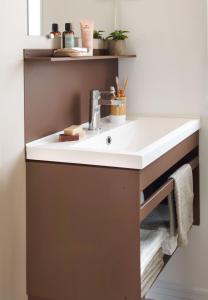 a bathroom with a sink and a counter at Frantheor Saint-Raphael 4 étoiles in Saint-Raphaël