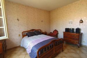 Ένα ή περισσότερα κρεβάτια σε δωμάτιο στο Villa Les Oliviers