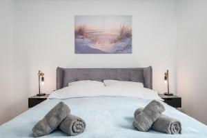 Postel nebo postele na pokoji v ubytování Harmony: Edersee Apartment – Sperrmauer – Lounge