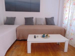 Зона вітальні в Lovely equipped apartment in Kallithea Athens