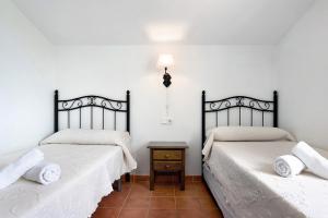 Postel nebo postele na pokoji v ubytování Casita 2 - Andalmar