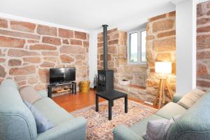 Χώρος καθιστικού στο Casa Rio Contença T5