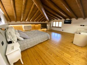 Postel nebo postele na pokoji v ubytování B&B Tenuta Le Rondini