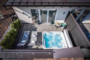 The swimming pool at or close to Vitaurina Royal Hotel