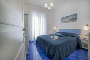 Postel nebo postele na pokoji v ubytování B&B Amalba Maiori