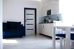 Kuchnia lub aneks kuchenny w obiekcie Apartamenty Scarlet