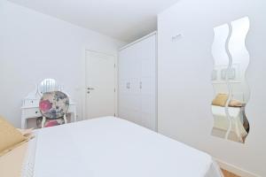 Postel nebo postele na pokoji v ubytování Apartment Đaninovica II