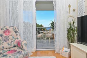 TV a/nebo společenská místnost v ubytování Apartment Đaninovica II