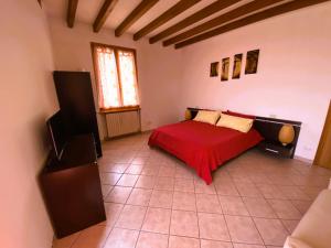 Postel nebo postele na pokoji v ubytování B&B Tenuta Le Rondini