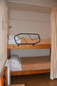 Cama o camas de una habitación en Apartamentos SNÖ Edelweiss