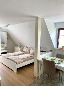 Postel nebo postele na pokoji v ubytování Ferienwohnung Ankerplatz 4