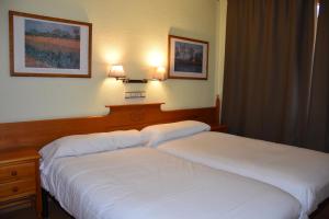 Cama o camas de una habitación en Apartamentos SNÖ Edelweiss