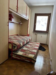 A bed or beds in a room at Passeggiando nel Verde