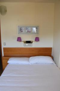Cama o camas de una habitación en Apartamentos SNÖ Edelweiss