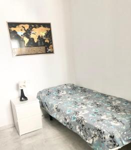 Postel nebo postele na pokoji v ubytování Maravilloso alojamiento en pleno centro de Dos Hermanas