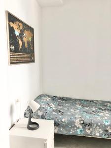 Postel nebo postele na pokoji v ubytování Maravilloso alojamiento en pleno centro de Dos Hermanas
