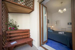Postel nebo postele na pokoji v ubytování B&B Amalba Maiori